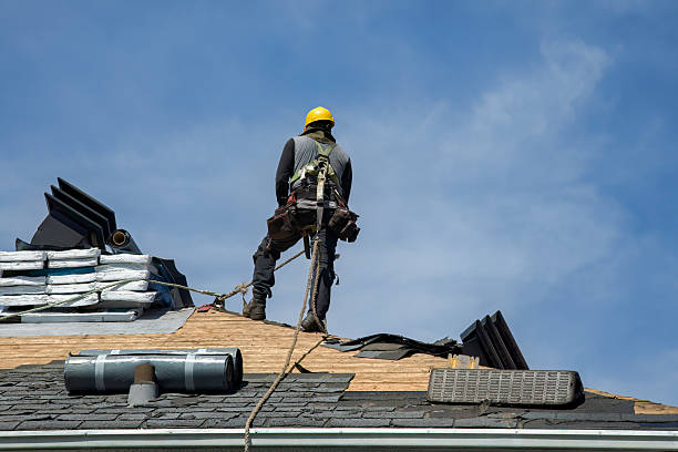 Professional Roof Replacement technician working in Willard, NY